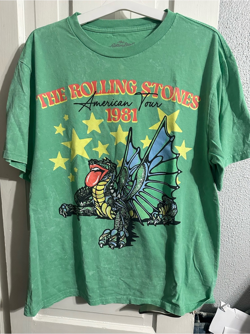 the Rolling Stones Green Short Sleeve Tee with Dragon Graphic